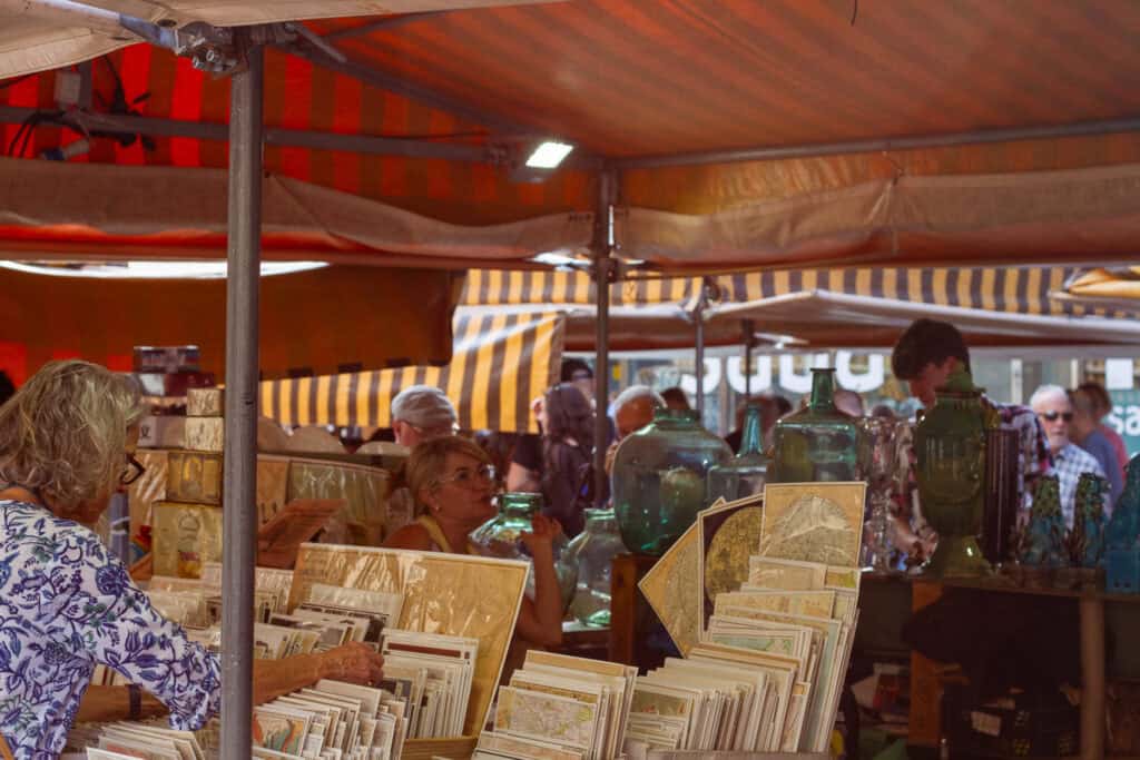 Close up shot of maps on a vendor's table