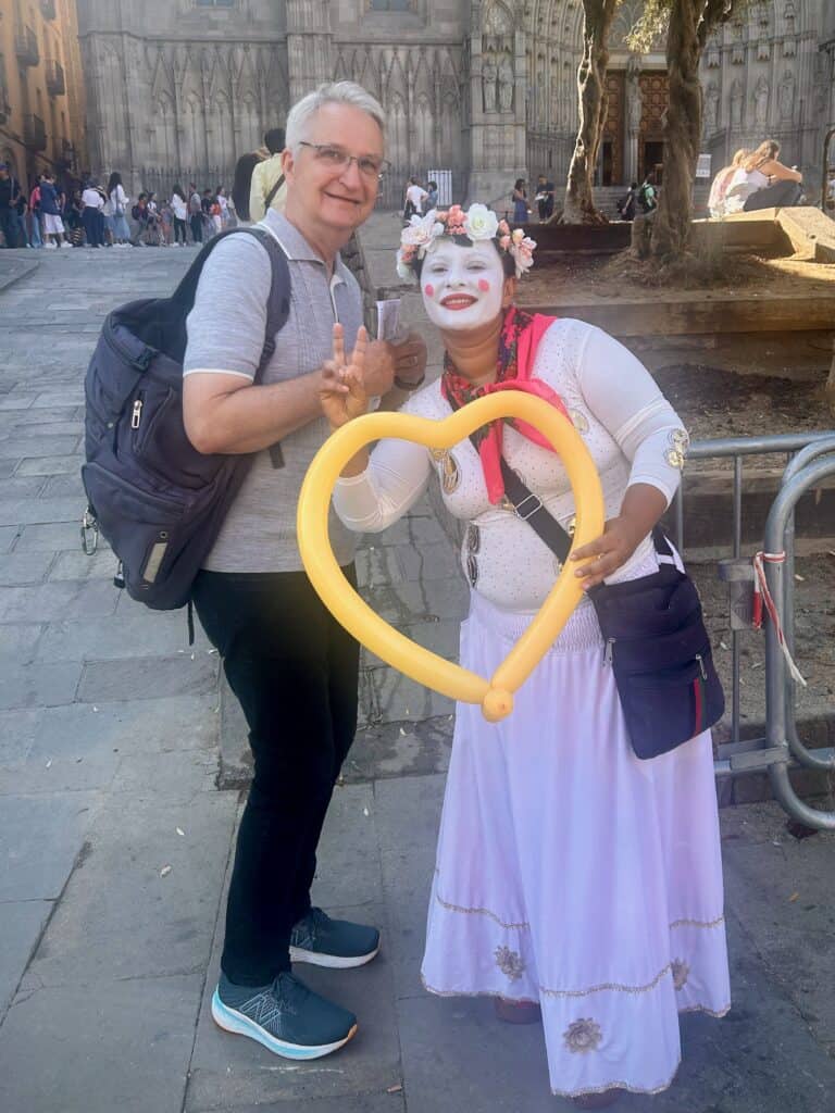 Man poses with Cathedral Clown