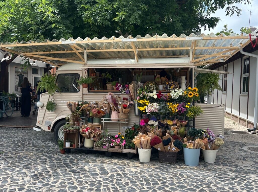 Bus of flowers at the LXFactory in Lisbon, Portugal.