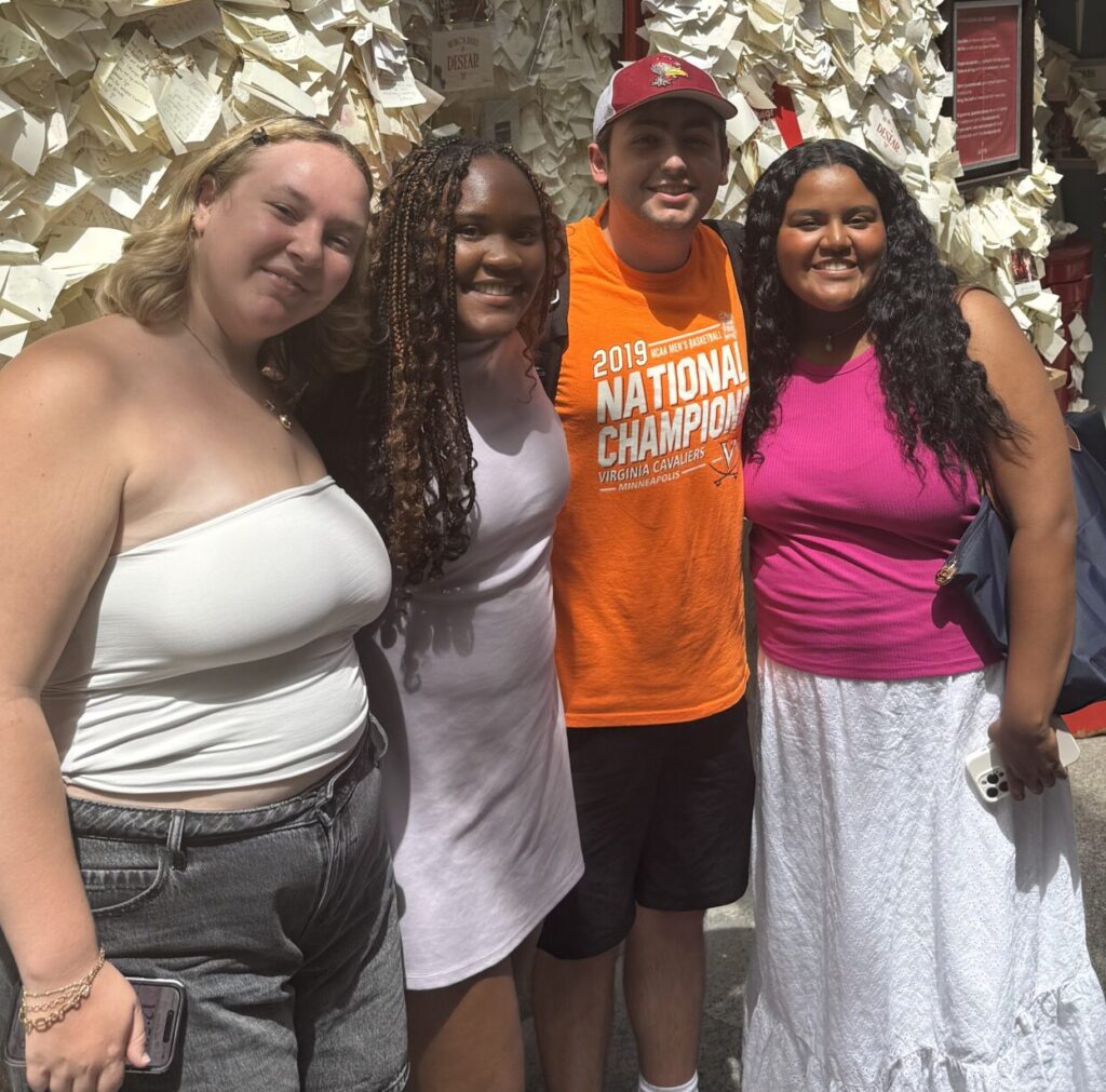 Multimedia Group 7 outside La Tienda de Los Deseos in Madrid. From left to right: Georgia Allen, Ayanna Marshall, Teddy Chavez and Sarah Muñoz.